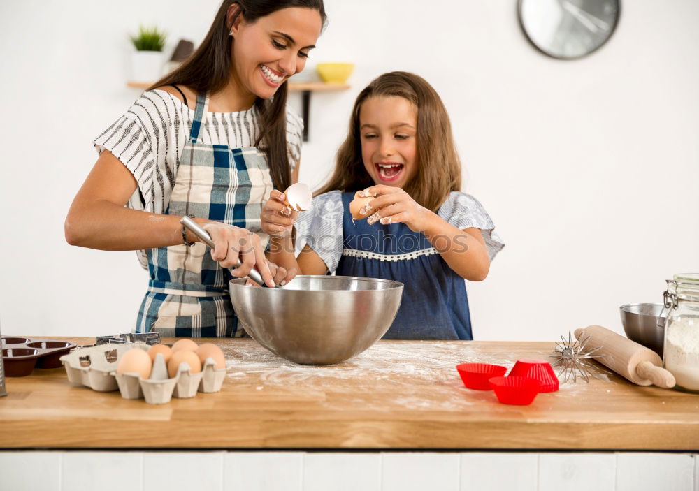 Similar – Image, Stock Photo Little sisters girl preparing baking cookies.