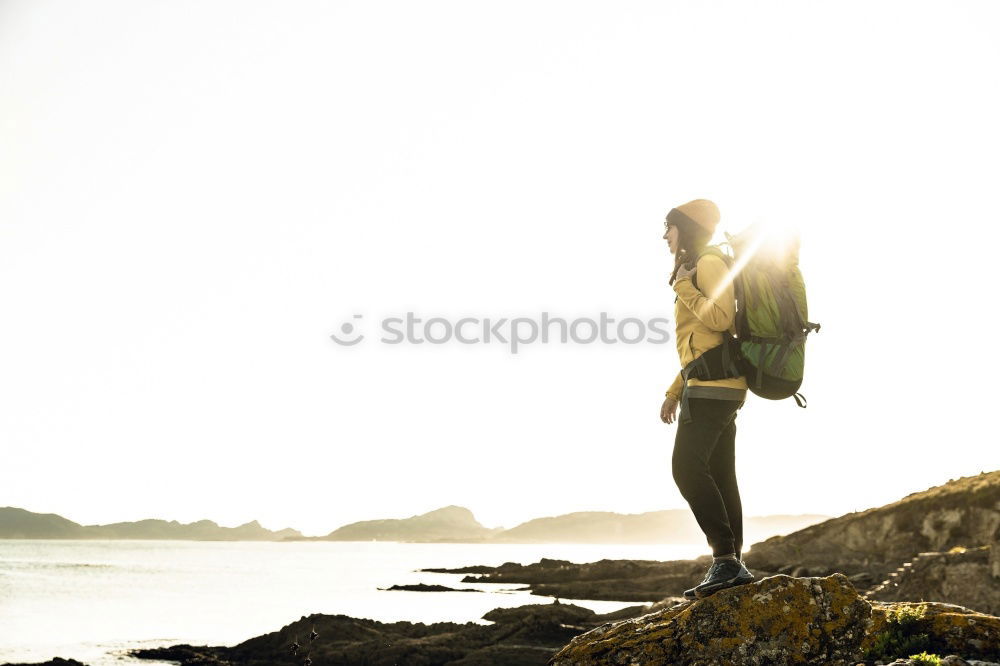 Similar – Image, Stock Photo Woman on stones near sea coast