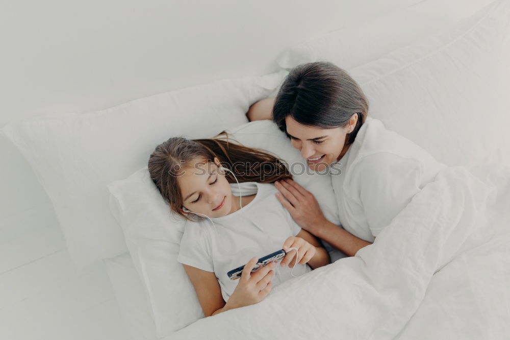 Similar – Image, Stock Photo happy mother and child son playing in bed