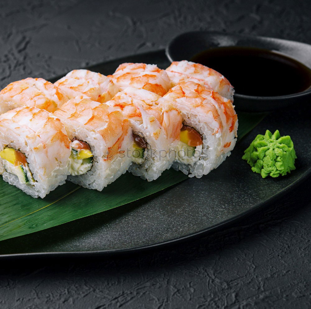 Similar – sushi assortment in white plate and soya sauce