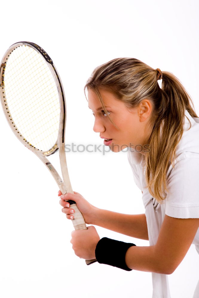 Similar – Face of a young woman hiding behind a featherball bat. Repeating the colour red. Sports grouch. Unsportsmanlike. Defense