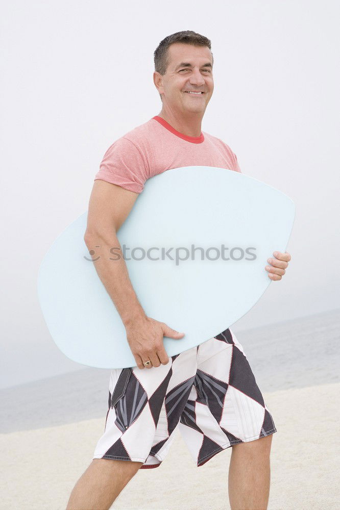 Similar – Young man having fun at the beach