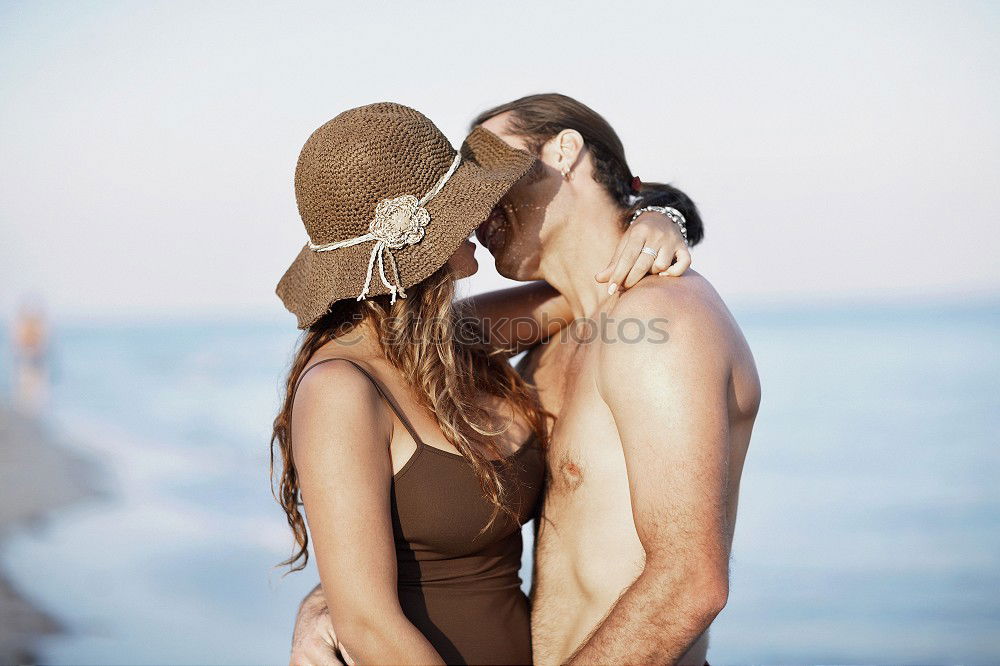 Similar – Image, Stock Photo Loving couple posing on beach