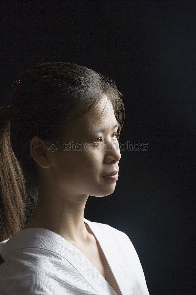 Similar – thoughtful woman with double braid