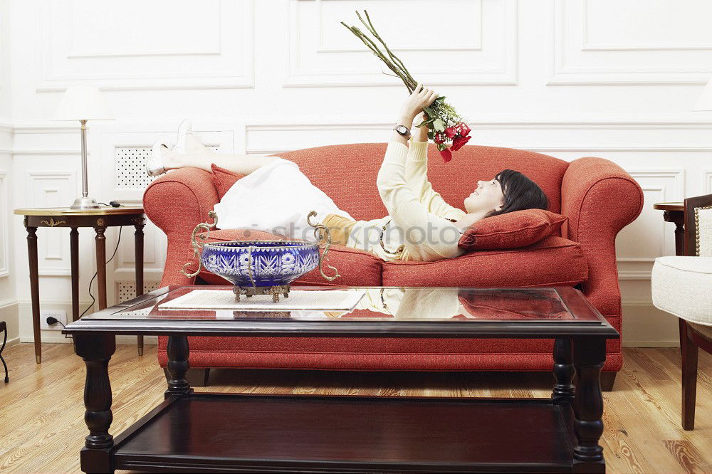 Similar – Image, Stock Photo Woman at home reading in an armchair