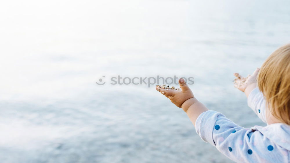 Similar – Image, Stock Photo A girl stretching arms and throwing Color powder