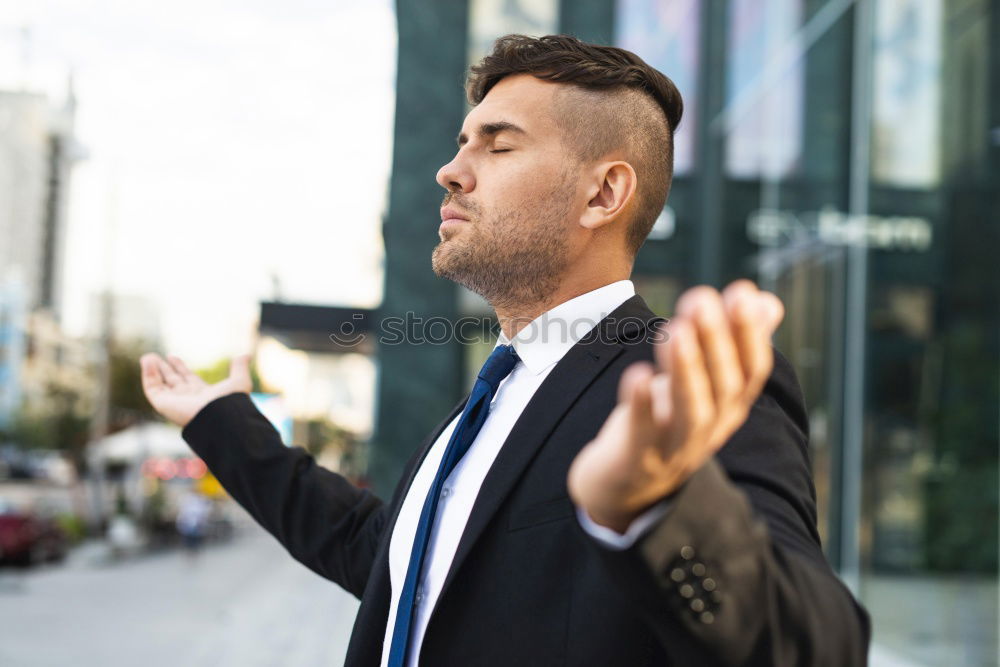 Similar – Image, Stock Photo Elegant Young Businessman in the Street Using a Mobile Phone