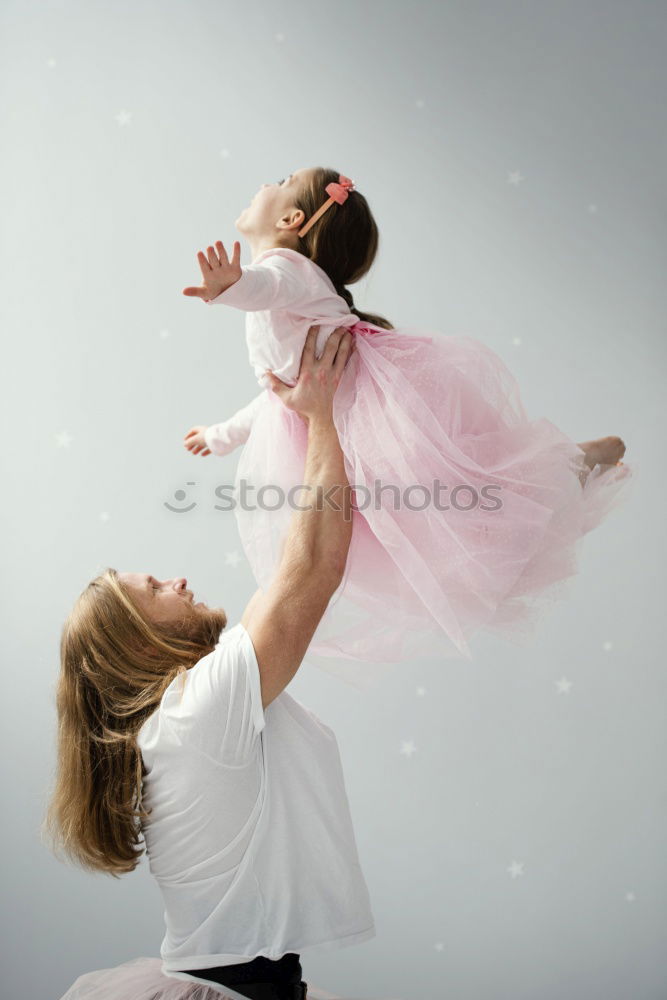 Similar – Father and son playing on the beach at the day time. Concept of friendly family.