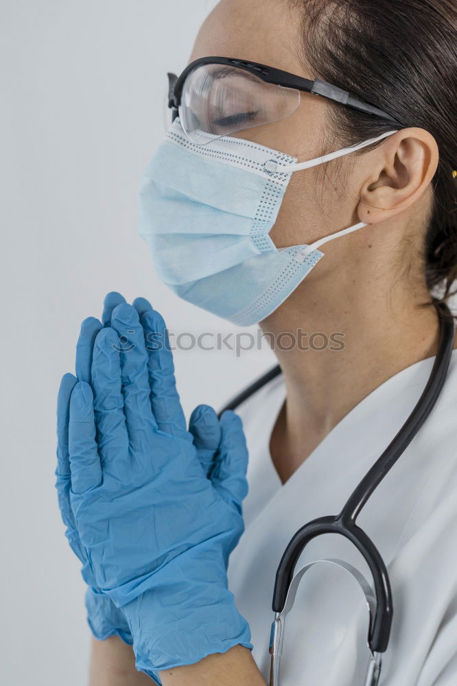 Similar – Image, Stock Photo Female doctor with face mask, protective gloves and lab coat