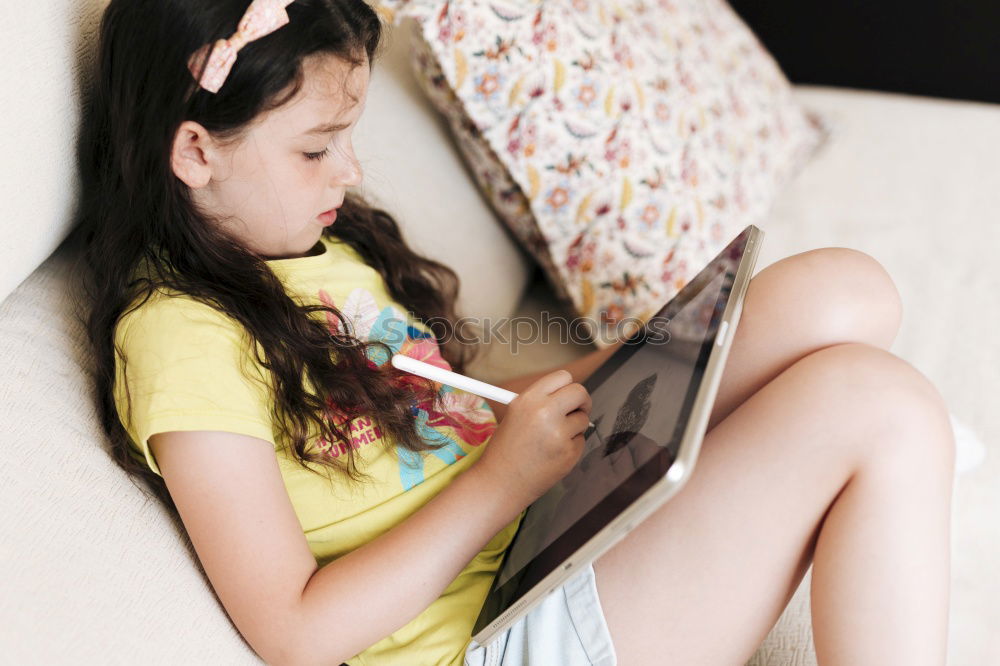 Image, Stock Photo Teenage girl listening to music and chatting with friends on smartphone sitting in hammock at home