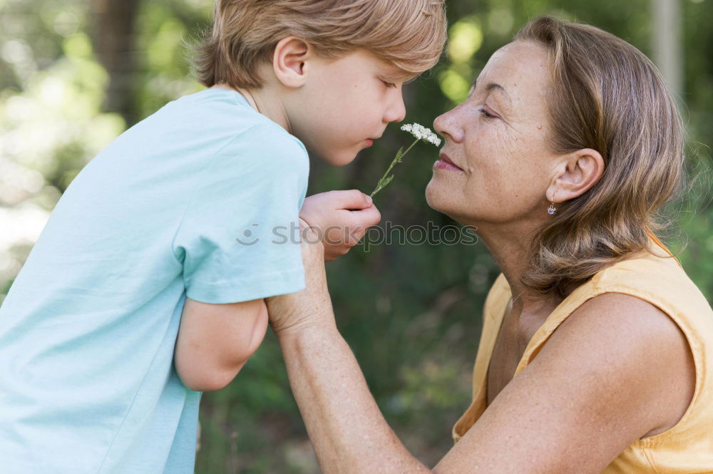 Similar – Boy kissing his grandmother