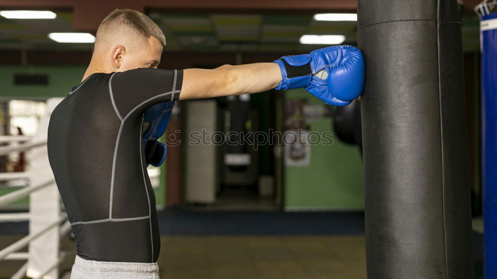 Similar – Image, Stock Photo Young thai boxing man is doing a workout for fight