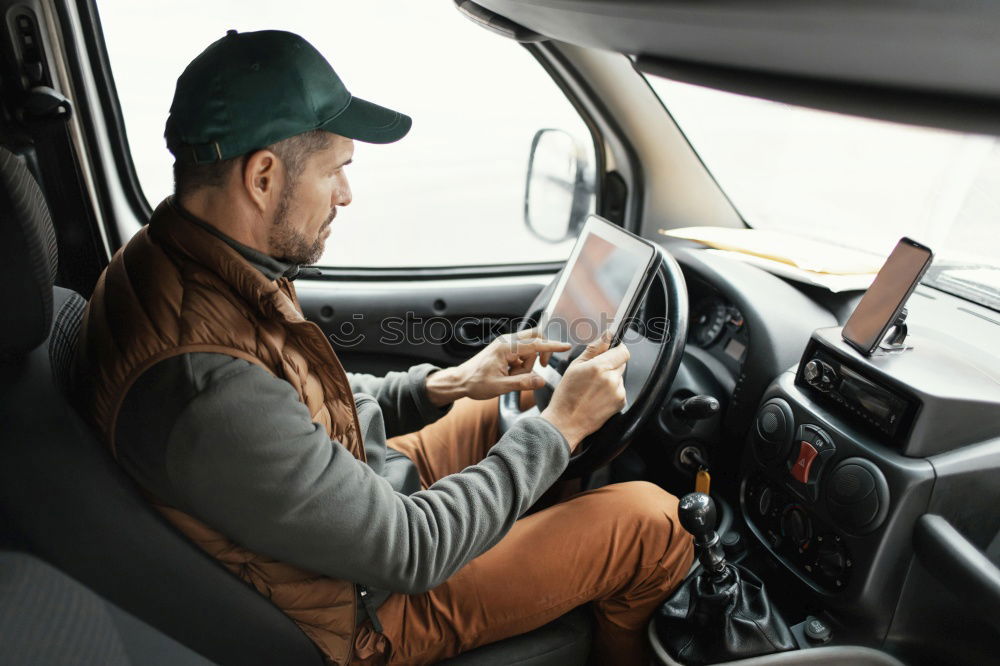 Similar – Image, Stock Photo Young man driving a car