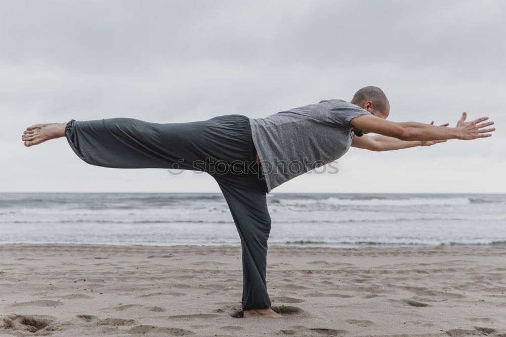 Similar – Image, Stock Photo Caucasian blonde woman practicing yoga in the beach