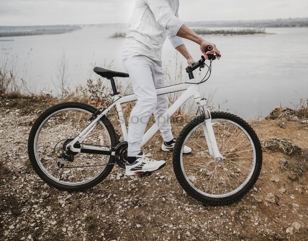 Similar – Image, Stock Photo Man walking with mountain biking