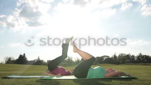 Image, Stock Photo woman doing yoga and pilates outdoor with her mat