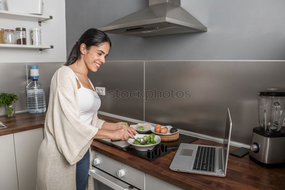 Similar – Image, Stock Photo Happy contented housewife in her kitchen