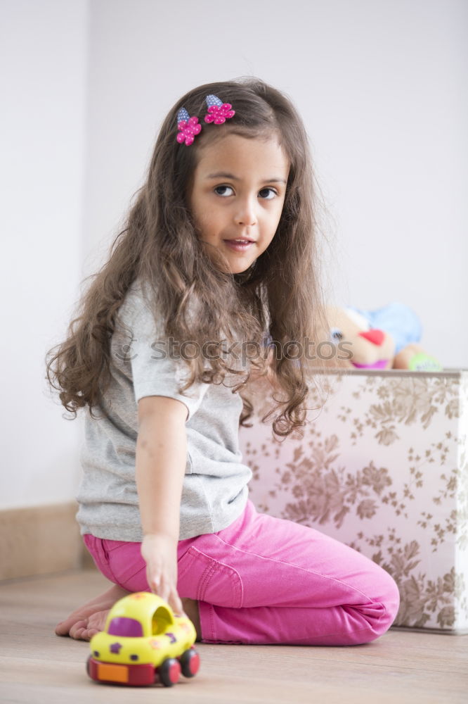 Similar – Image, Stock Photo African girl sits next to her teddy bear at home