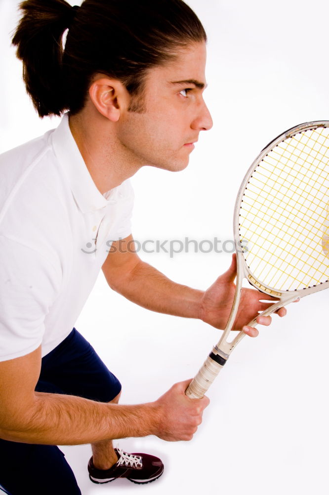 Similar – Face of a young woman hiding behind a featherball bat. Repeating the colour red. Sports grouch. Unsportsmanlike. Defense