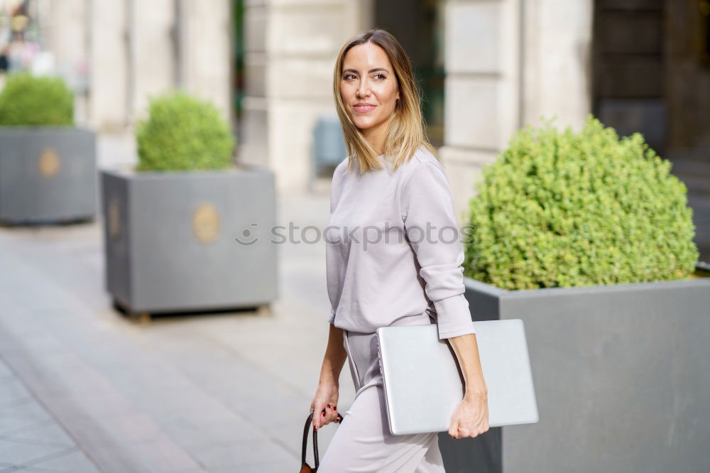 Similar – Image, Stock Photo Attractive blond woman chatting on her smartphone