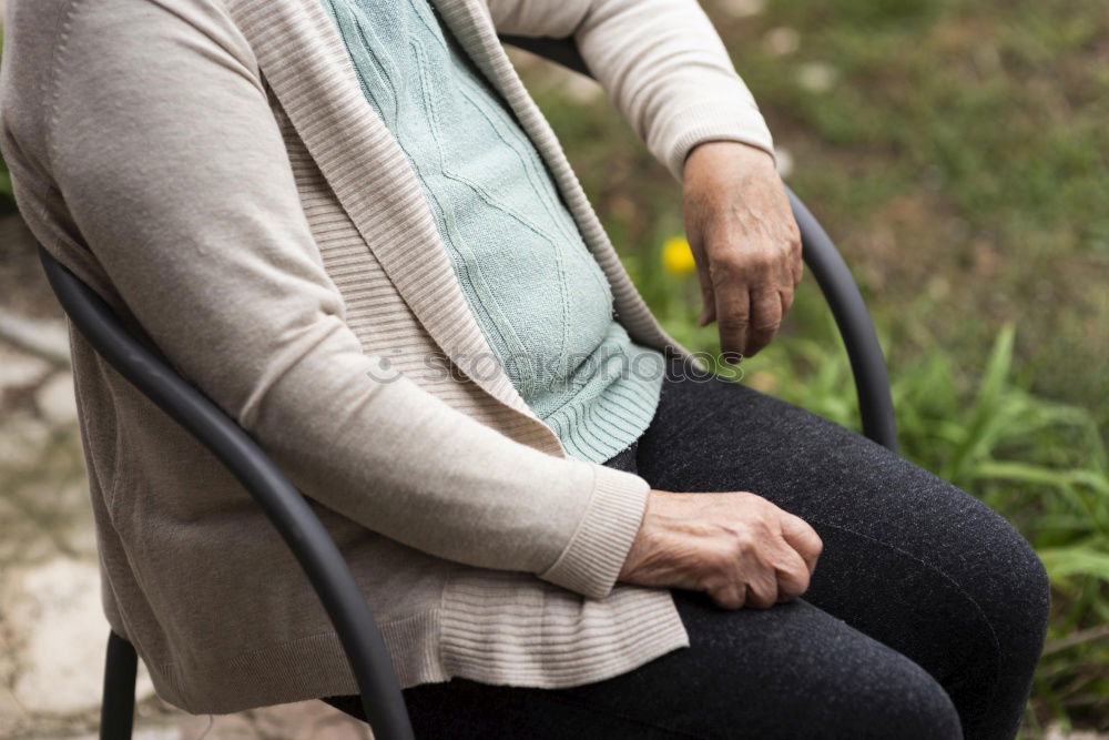 Similar – Senior citizen looks up in autumn forest