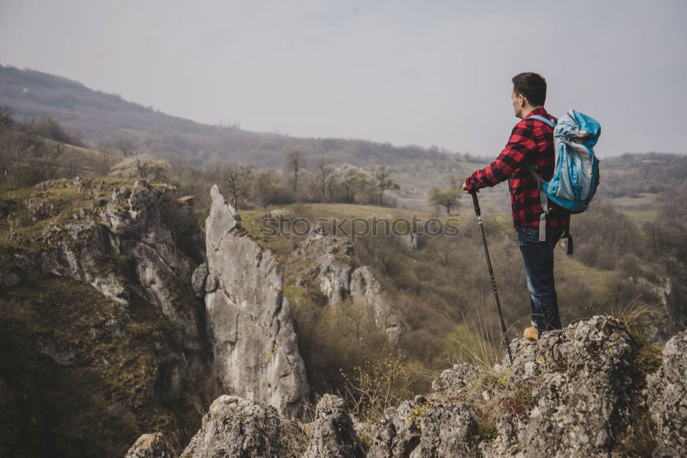 Similar – Boy hiking among the dwarf pine