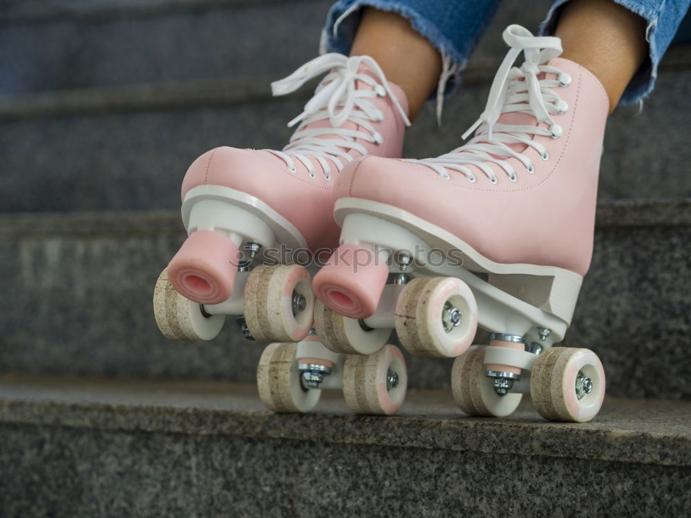 Similar – A pair of roller skates on the sidewalk.