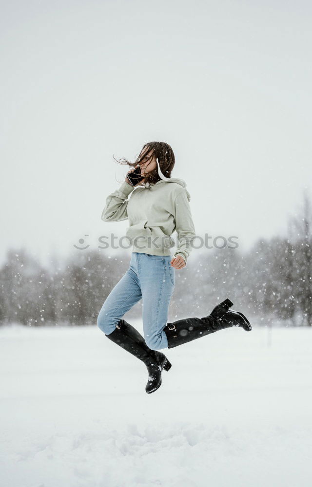 Similar – Image, Stock Photo Young and pretty woman enjoying a snowy winter day