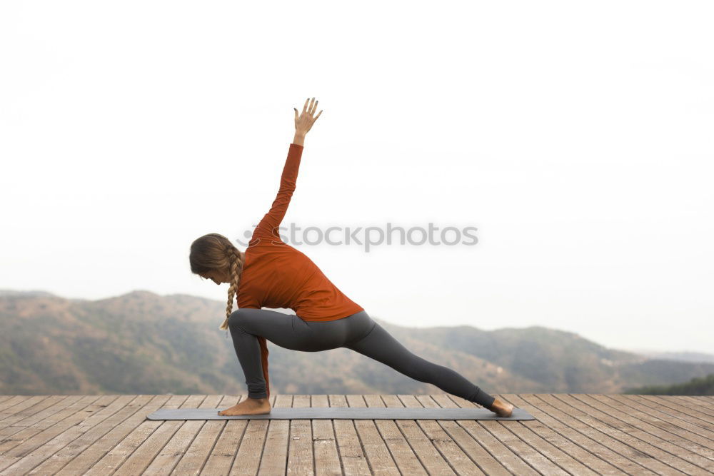 Similar – Image, Stock Photo Attractive woman working out on a wooden deck
