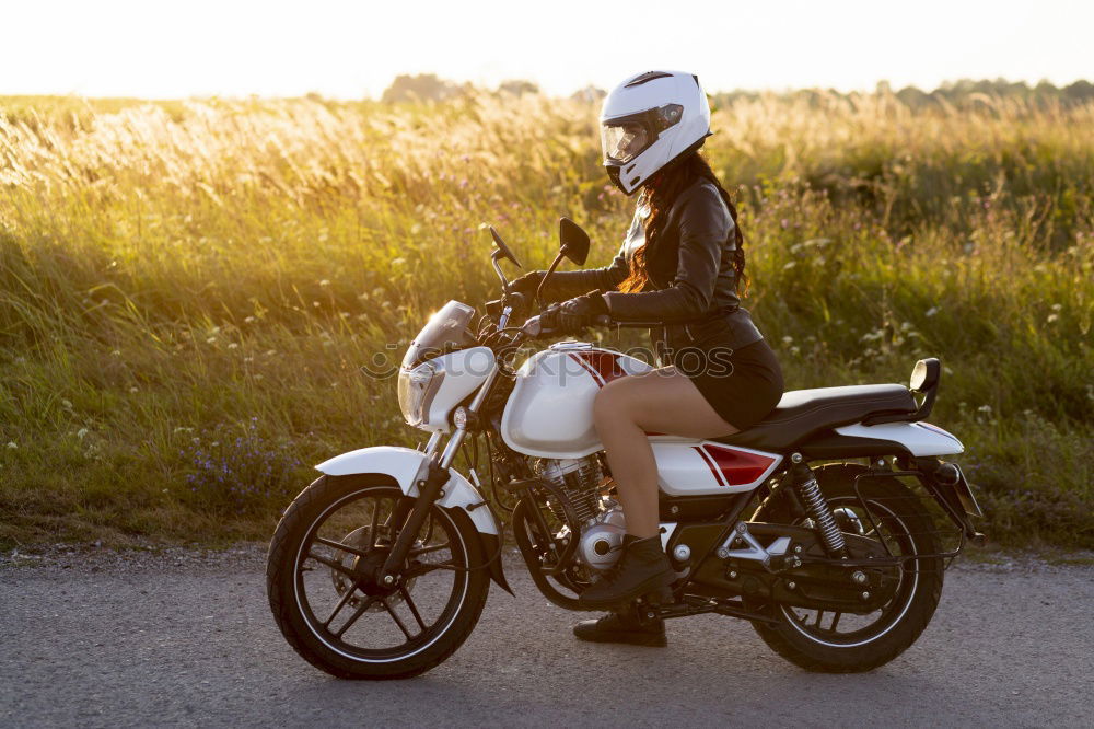 Similar – Image, Stock Photo Man sitting near motorcycle