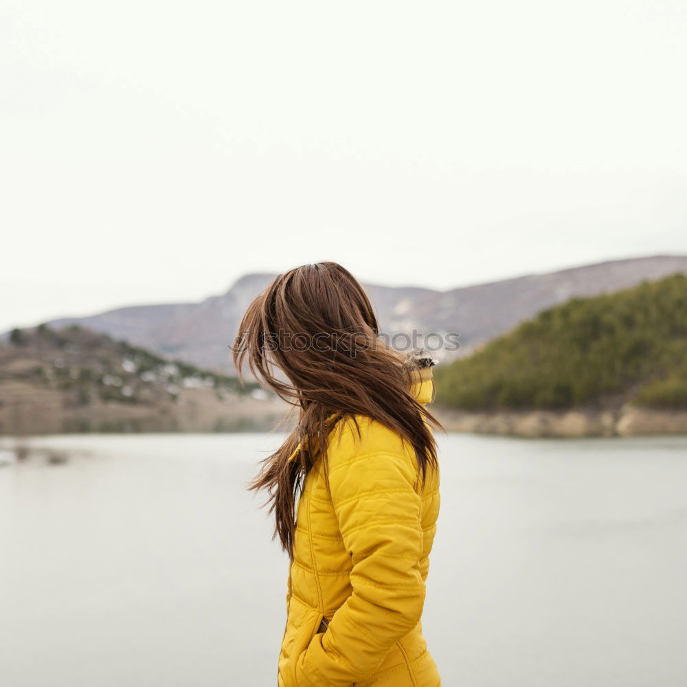 Similar – Woman posing at lake