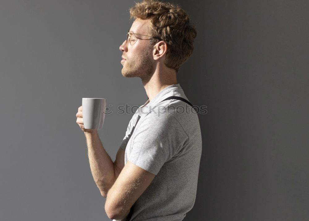 Similar – Image, Stock Photo Young man wearing winter clothes standing in the street