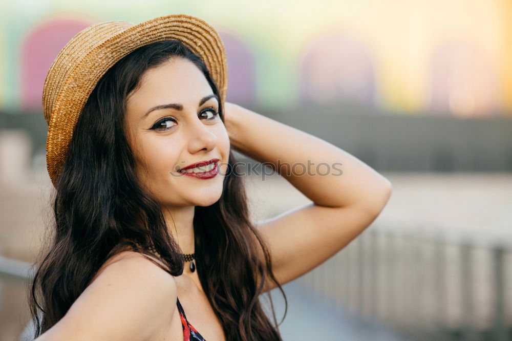 Similar – Brunette woman leaning on handrail at river