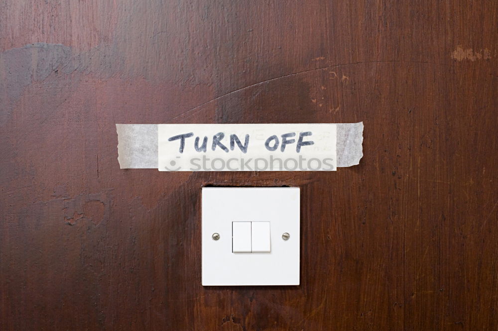 Image, Stock Photo Door opener is at the switch and again oversized above the switch on the rough plastered wall