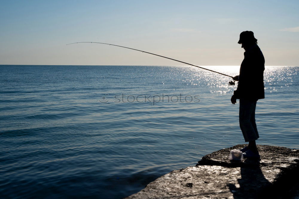 Similar – Image, Stock Photo Man fishing on mountain lake