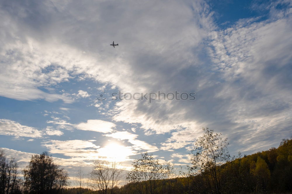 Similar – plane in the sun Rollfeld