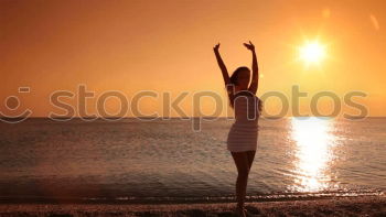 Similar – Happy children playing on the beach at the sunset time. Two Kids having fun outdoors. Concept of summer vacation and friendly family.