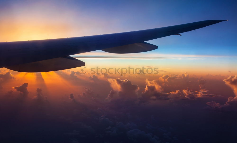 Similar – Aeroplane view into the setting sun