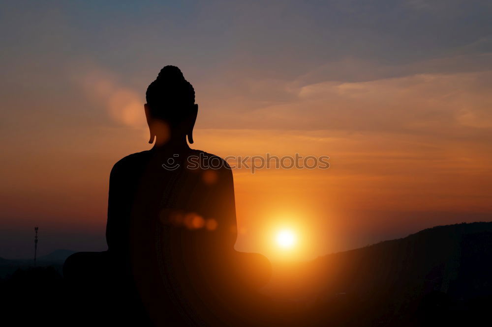 Similar – Image, Stock Photo The silhouette of man sitting alone at the beach