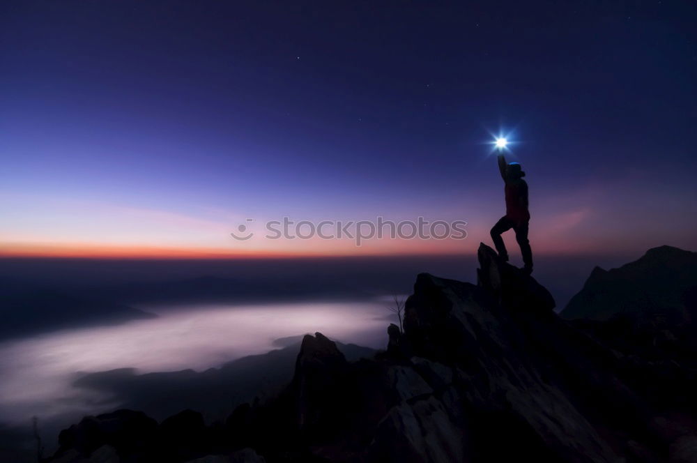 Similar – Silhouetted Hiker