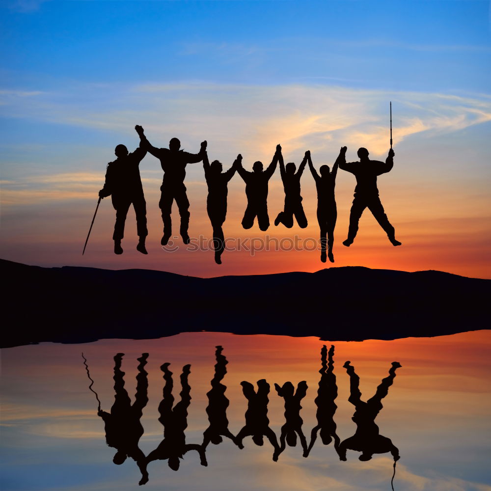 Similar – Four people jumping at sunset.