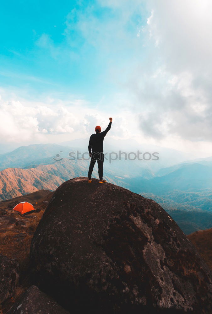 Similar – Image, Stock Photo Boy standing among the dwarf pines on mountain trail