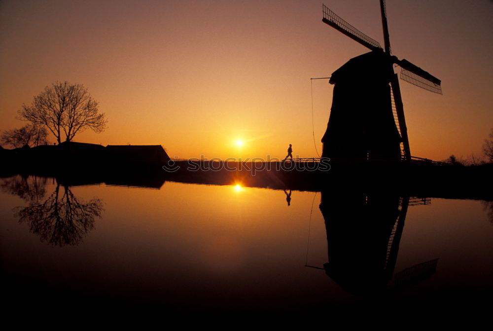 Similar – Image, Stock Photo charming windmill by lake at misty sunrise