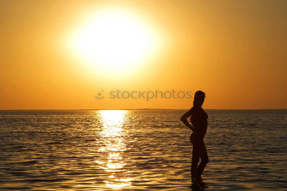 Similar – Happy children playing on the beach at the sunset time. Two Kids having fun outdoors. Concept of summer vacation and friendly family.