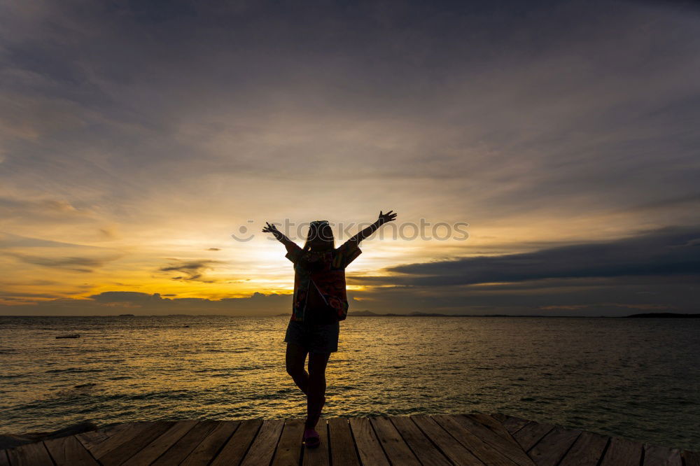 Similar – Image, Stock Photo Father and son playing on the beach at the sunset time. People having fun outdoors. Concept of happy vacation and friendly family.