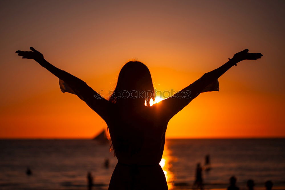 Similar – Image, Stock Photo Mother and son playing on the beach at the sunset time. People having fun outdoors. Concept of happy vacation and friendly family.