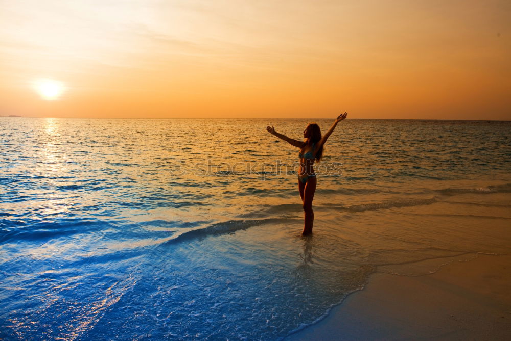 Similar – Happy children playing on the beach at the sunset time. Two Kids having fun outdoors. Concept of summer vacation and friendly family.