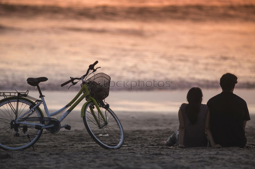 Similar – Image, Stock Photo unrecognizable Cyclist holding water canteen. sunset