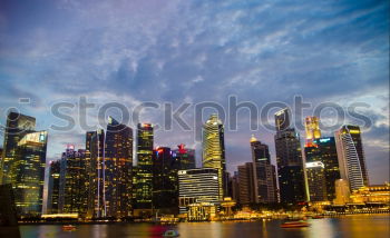 Similar – Image, Stock Photo Cae la noche en Singapur