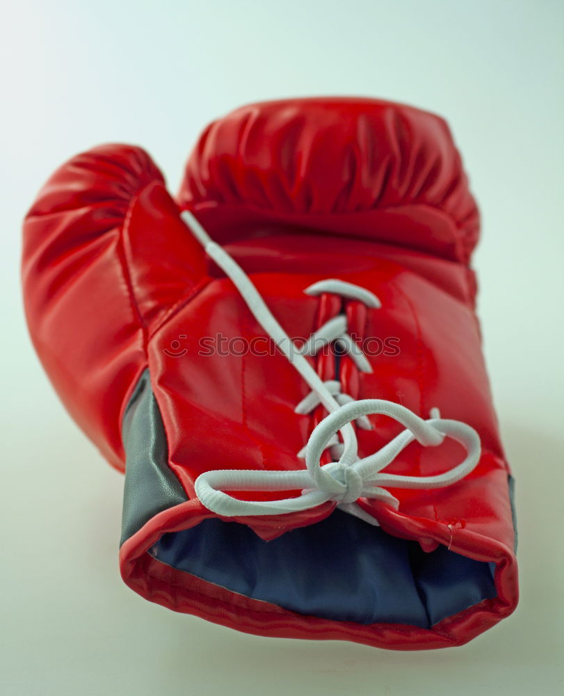 Similar – Image, Stock Photo red leather boxing gloves and a black textile bandage